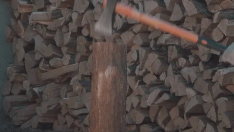 Chopping ax with a log in slow motion Stock Footage 127714247