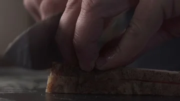 Chopping Bacon in slices Stock Footage 85884748