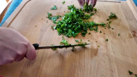 Chopping basil Stock Footage 320841005