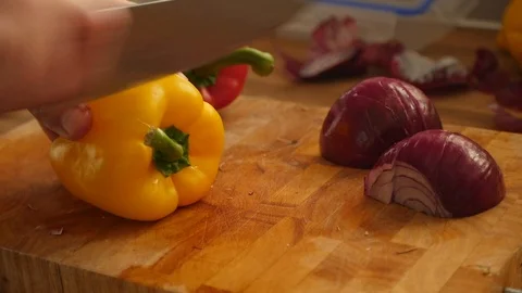 Chopping bell peppers Stock Footage 115054850