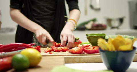 Chopping a big red pepper in chunks Stock Footage 61535102