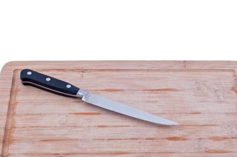 Chopping board with a knife  closeup 写真素材