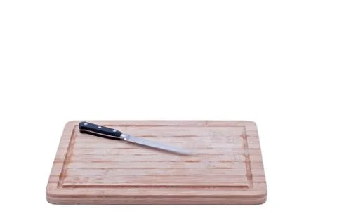 Chopping board with a knife front view Stock Photos