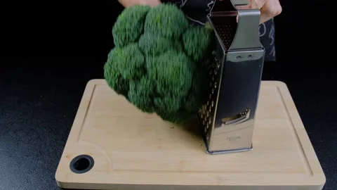 Chopping Broccoli with Mini Chopper in Cooking Kitchen Stock Footage 341439782