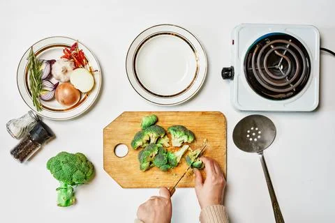 Chopping Broccoli for soup Stock Photos