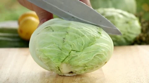 Chopping  cabbage  on board Stock Footage 83435548