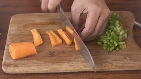 Chopping Carrot on a  board 動画素材 77015580