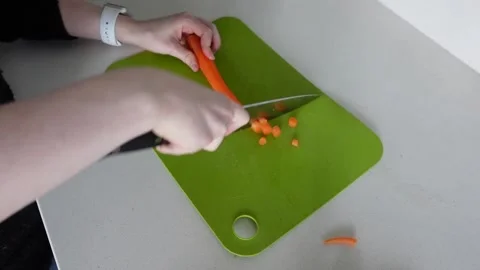 Chopping Carrots 01 Stock Footage 147833806