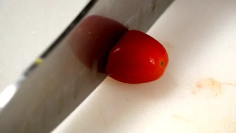 Chopping Cherry Tomato 1 Stock Footage 82846708