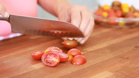 Chopping cherry tomato Stock Footage 54796987