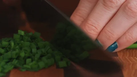 Chopping Chives on a Cutting board Stock Footage 85476066
