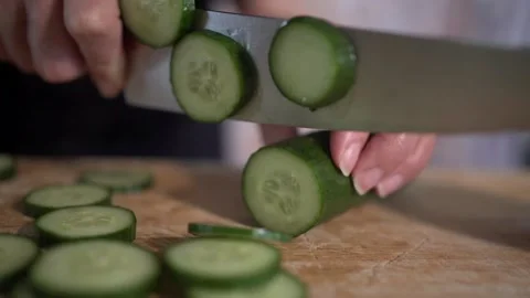 Chopping cucumber b roll Stock Footage 131046872