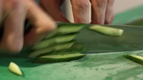 Chopping a cucumber Stock Footage 82076750