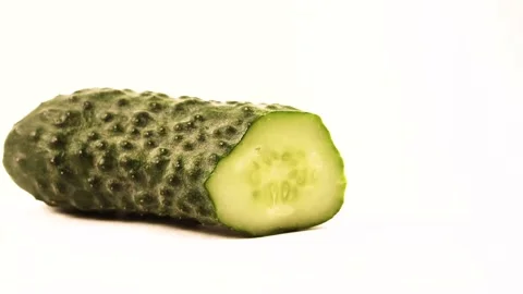 Chopping cucumber. Stop motion animation. Stock Footage 136309883