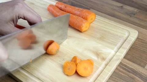Chopping The Ends Off Carrots Video stock 134345466