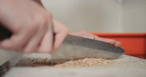 Chopping up fennel in the back of a kitchen Stock-Footage 105297211