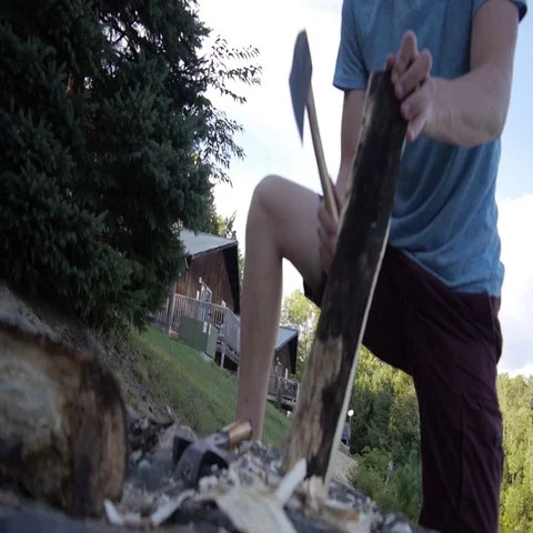 Chopping fire wood log with axe Stock Footage 69333983