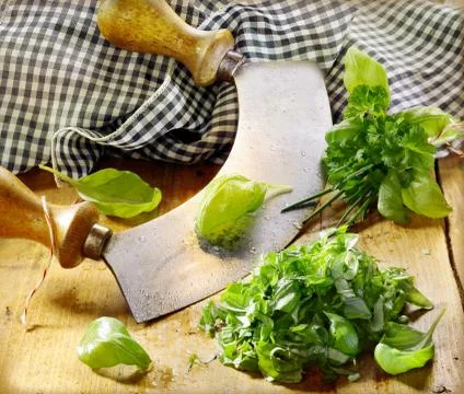 Chopping fresh basil Stock Photos