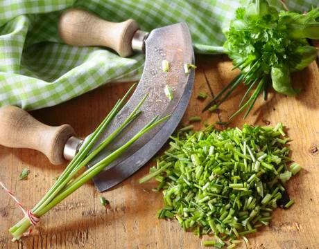 Chopping fresh chives Stock Photos