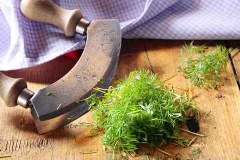 Chopping fresh dill Stock Photos
