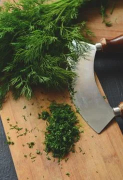 Chopping fresh dill Stock Photos