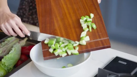 Chopping fresh herbs on a cutting board Stock Footage 336466214