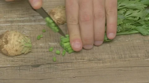 Chopping Fresh Herbs to Elevate Your Culinary Creations and Delicious Dinner Stockbeeldmateriaal 281930814