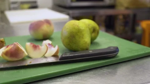 Chopping fruit 1 Stock Footage 229578910