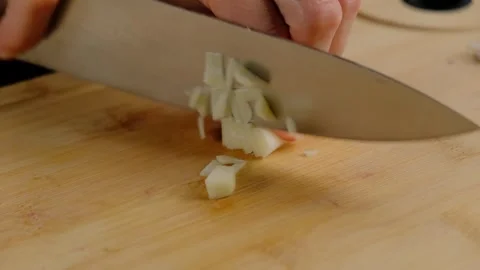 Chopping Garlic Close-up in Cooking Kitchen Stock-Footage 341435021