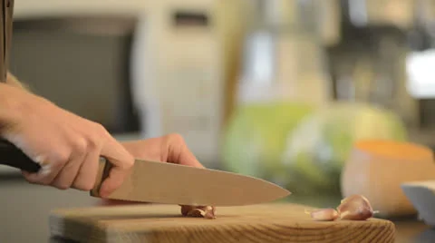 Chopping garlic Stock Footage 24620748
