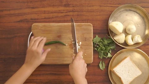Chopping Green Chillies Top Angle 動画素材 76959080