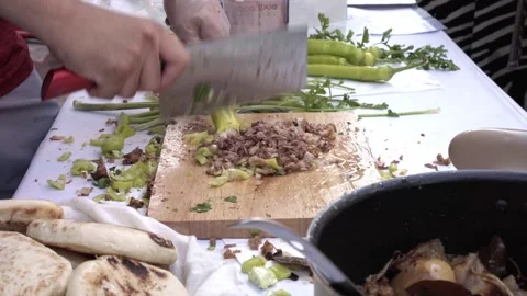Chopping green pepper beside minced roasted meat 스톡 동영상 339204889