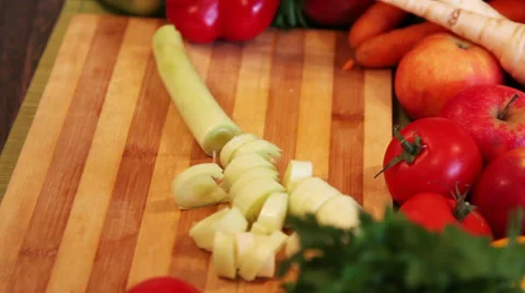 Chopping leek Vídeo Stock 34254106