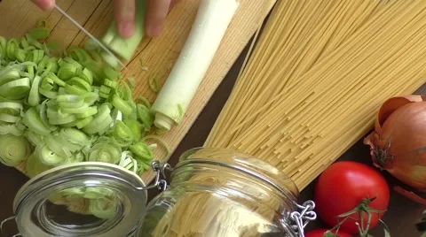 Chopping leek for a soup Stock Footage 52823720