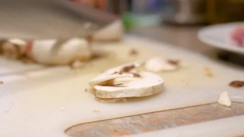 Chopping mushrooms with knife Stock Footage 78978154