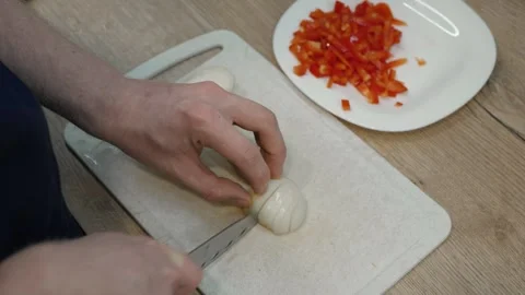 Chopping onion on board Stock Footage 323656369