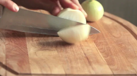 Chopping onion on halfs Stock Footage 35891976