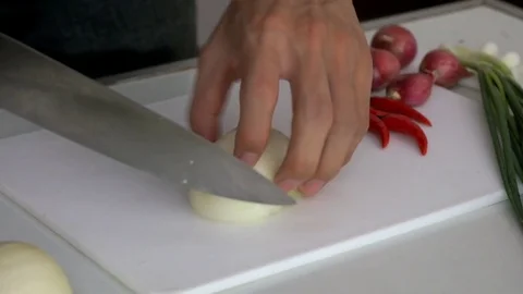 Chopping Onion for making fried rice Stock Footage 74008672