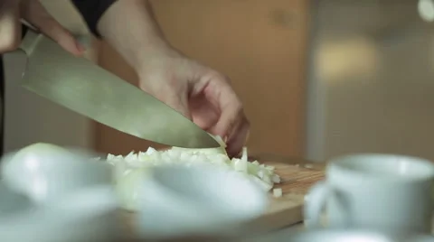 Chopping Onions in the Kitchen Focus Pull Stock Footage 50613996