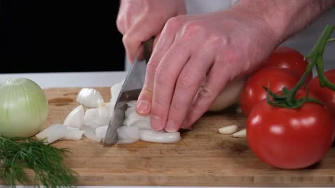 Chopping onions with knife Stock Footage 219569849