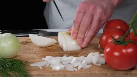 Chopping onions with knife Stock Footage 219757621