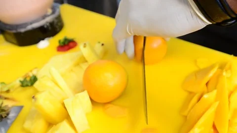 Chopping Orange Stock Footage 78547190