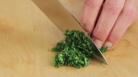 Chopping parsley Stock Footage 24666987