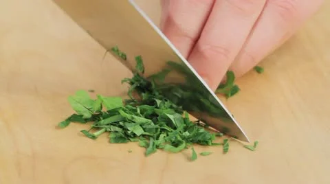 Chopping parsley Stock Footage 24667842
