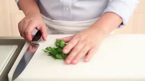 Chopping parsley Stock Footage 24672469