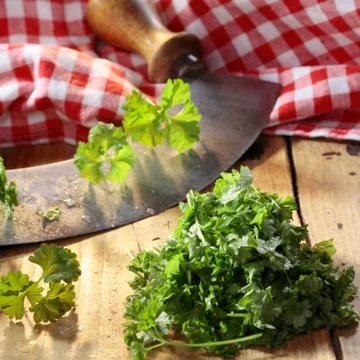 Chopping parsley Stock Photos