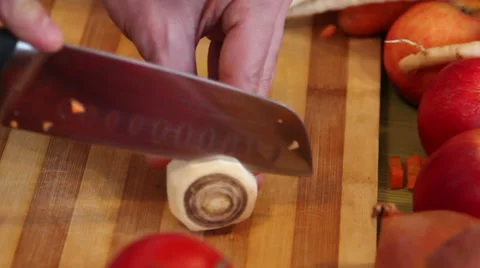 Chopping parsnips Stock Footage 34253803