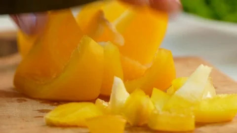 Chopping Peppers On Cutting Board Video stock 83460438