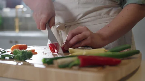 Chopping Peppers in slowmotion Stock Footage 254590030