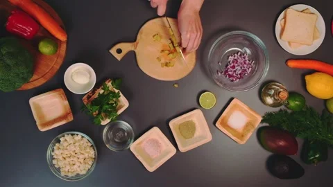 Chopping a pickled cucumber in the kitchen Stock-Footage 252180647